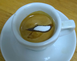 Sugar floats on perfect espresso