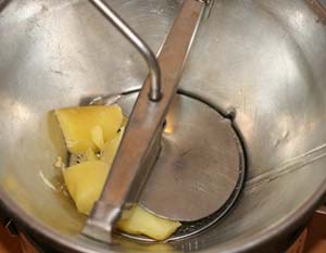 food-mill-with-potatoes