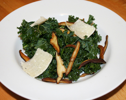 tuscan kale salad with shitake mushrooms and parmesian slices 